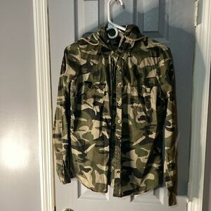 Slightly worn ladies shirt with detachable hood